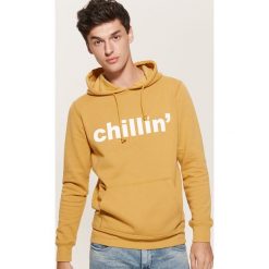 Bluza z napisem - Żółty. Żółte bejsbolówki męskie House, l, z napisami. Za 69,99 zł.