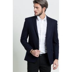 Trussardi - Marynarka. Niebieskie garnitury męskie marki Trussardi, bez wzorów, z elastanu. W wyprzedaży za 999,90 zł.