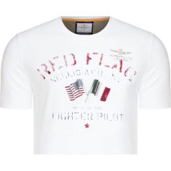 T-shirt AERONAUTICA MILITARE Biały. Białe t-shirty męskie marki Aeronautica Militare, z nadrukiem, z bawełny, militarne, z okrągłym kołnierzem. Za 240,00 zł.