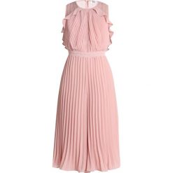 True Decadence Tall Kombinezon nude. Różowe kombinezony damskie True Decadence Tall, bez wzorów, z poliesteru, bez kołnierzyka, bez rękawów. Za 459,00 zł.
