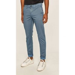 Pepe Jeans - Spodnie Charly Minimal. Żółte spodnie męskie Pepe Jeans, bez wzorów, z elastanu. W wyprzedaży za 239,90 zł.