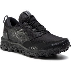 Buty ASICS - GEL-FujiTrabuco 8 G-TX GORE-TEX 1012A573 Black/Black 001. Czarne buty sportowe damskie Asics, bez wzorów, z tworzywa sztucznego, sportowe, do biegania, gore-tex. Za 629,00 zł.