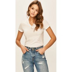 Tommy Hilfiger - T-shirt. Białe bluzki damskie TOMMY HILFIGER, s, z aplikacjami, z bawełny, casualowe, bez kołnierzyka. Za 179,90 zł.