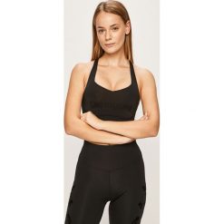 Desigual Sport - Biustonosz sportowy. Czarne biustonosze sportowe damskie Desigual Sport, s, z nadrukiem, z elastanu. W wyprzedaży za 129,90 zł.