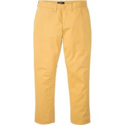 Spodnie chino Regular Fit Straight bonprix żółty curry. Pomarańczowe spodnie męskie bonprix, m, klasyczne. Za 99,99 zł.