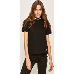 Calvin Klein Jeans - T-shirt. Czarne bluzki damskie Calvin Klein Jeans, s, bez wzorów, z bawełny, z okrągłym kołnierzem. Za 229,90 zł.