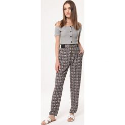 Brązowe Spodnie Feet. Pomarańczowe spodnie damskie Born2be, s, bez wzorów, z tkaniny, z podwyższonym stanem. Za 54,99 zł.