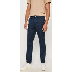 EA7 Emporio Armani - Spodnie. Niebieskie spodnie męskie EA7 Emporio Armani, na co dzień, s, bez wzorów, z elastanu. W wyprzedaży za 399,90 zł.