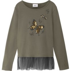 Shirt dziewczęcy z długim rękawem i tiulową wstawką bonprix ciemnooliwkowo-czarny. Zielone bluzki dziewczęce bonprix, z aplikacjami, z elastanu, z okrągłym kołnierzem, z długim rękawem, długie, bez kaptura. Za 37,99 zł.