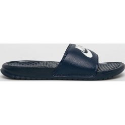 Nike Sportswear - Klapki Benassi Just Do it. Niebieskie klapki damskie Nike Sportswear, bez wzorów, z materiału, bez obcasa. Za 119,90 zł.