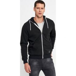Czarna Bluza Irinelin. Czarne bluzy męskie Born2be, xxl, bez wzorów, bez kołnierzyka, bez rękawów, bez kaptura. Za 89,99 zł.