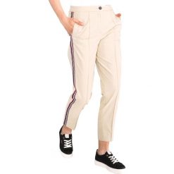 Tommy Hilfiger Spodnie Beżowy. Brązowe spodnie damskie TOMMY HILFIGER, s, bez wzorów, z bawełny. Za 602,95 zł.