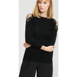 Czarny Sweter Flurry. Czarne swetry klasyczne damskie marki other, na jesień, xl. Za 69,99 zł.