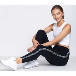 Granatowe Legginsy Glitches. Niebieskie legginsy damskie marki Born2be, l. Za 29,99 zł.