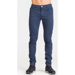 GRANATOWE SPODNIE TRUSSARDI JEANS. Niebieskie spodnie męskie Trussardi Jeans, na imprezę, m, z aplikacjami, z jeansu. Za 235,00 zł.