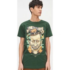 Koszulka z kolekcji Ink Ready - Turkusowy. Niebieskie koszulki męskie Cropp, s, bez wzorów, bez kołnierzyka, bez rękawów. W wyprzedaży za 35,99 zł.