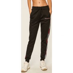 Tommy Sport - Spodnie. Czarne spodnie damskie Tommy Sport, s, bez wzorów, z poliesteru. Za 399,90 zł.