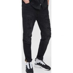 Jeansy slim -. Jeansy męskie Cropp, bez wzorów. Za 129,99 zł.