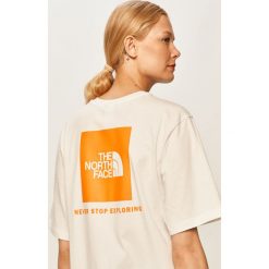 The North Face - T-shirt. Białe bluzki damskie The North Face, s, z nadrukiem, z bawełny, casualowe, z okrągłym kołnierzem. Za 119,90 zł.