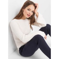Sweter ze skośnymi prążkami. Brązowe swetry klasyczne damskie marki Orsay, s, w prążki, z elastanu, z okrągłym kołnierzem. W wyprzedaży za 70,00 zł.