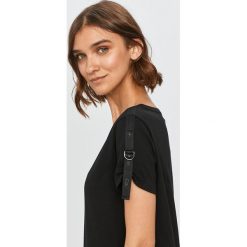 Calvin Klein - T-shirt. Czarne bluzki damskie Calvin Klein, s, z aplikacjami, z bawełny, casualowe, z okrągłym kołnierzem. Za 269,90 zł.