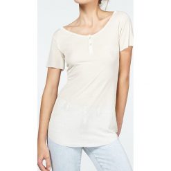 T-shirty damskie: Koszulka „Betybird” w kolorze kremowym