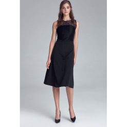 Czarna wizytowa sukienka z koronkowym dekoltem. Czarne sukienki damskie NIFE, xl, bez wzorów, z elastanu, eleganckie, bez kołnierzyka, bez rękawów, midi, rozkloszowane. Za 219,00 zł.