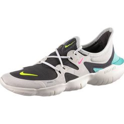 Buty "Free RN Flyknit 5.0" w kolorze szarym do biegania. Szare buty sportowe damskie do biegania. W wyprzedaży za 249,95 zł.