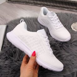 Buty sportowe damskie białe American Club - biały. Białe buty sportowe damskie American CLUB, bez wzorów, sportowe. Za 99,99 zł.