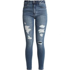 Abercrombie & Fitch SIMONE Jeans Skinny Fit medium destroy. Szare jeansy damskie skinny marki Abercrombie & Fitch, xl, z elastanu. Za 409,00 zł.