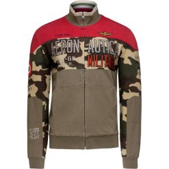 Bluza AERONAUTICA MILITARE. Pomarańczowe bluzy męskie Aeronautica Militare, z aplikacjami, z dzianiny, militarne, z włoskim kołnierzykiem, bez rękawów, bez kaptura. W wyprzedaży za 546,00 zł.