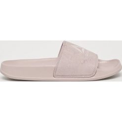 Reebok - Klapki. Fioletowe klapki damskie Reebok, bez wzorów, z gumy, bez obcasa, na płaskiej podeszwie. Za 69,90 zł.