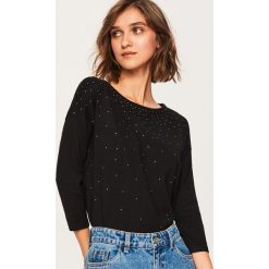 Sweter z aplikacjami - Czarny. Czarne bez kategorii Reserved, s. Za 59,99 zł.