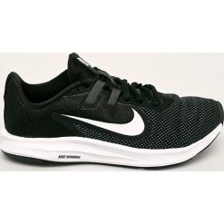 Nike - Buty Downshifter 9. Białe buty sportowe damskie Nike, bez wzorów, z gumy, sportowe. Za 259,90 zł.