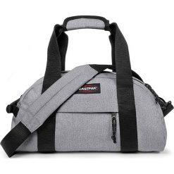 Torba podróżna "Compact" w kolorze szarym - 45,5 x 23 x 20 cm - 23 l. Szare torby podróżne Eastpak, w paski, z materiału. W wyprzedaży za 107,95 zł.