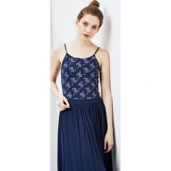 Body z nadrukiem. Bluzki damskie Moodo, xs, z nadrukiem, bez kołnierzyka, bez rękawów. Za 5,99 zł.