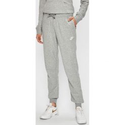 Nike Sportswear - Spodnie. Szare spodnie damskie Nike Sportswear, s, bez wzorów, z bawełny, casualowe. W wyprzedaży za 139,90 zł.