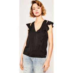 Bluzka Guess Dahab W01H92 W5OC0. Różowe bluzki damskie Guess, s, z aplikacjami, z poliesteru, bez kołnierzyka, bez rękawów. W wyprzedaży za 159,00 zł.