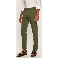 Tommy Hilfiger Tailored - Spodnie. Zielone spodnie męskie Tommy Hilfiger Tailored, bez wzorów, z elastanu. Za 449,90 zł.