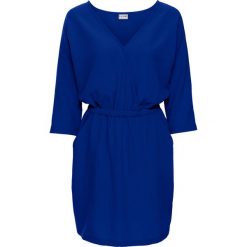 Shirt z dwustronnymi cekinami bonprix czarny. Czarne koszulki damskie bonprix, z napisami, z okrągłym kołnierzem, z krótkim rękawem. Za 74,99 zł.