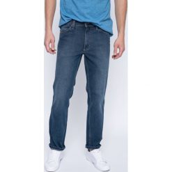 Mustang - Jeansy Tramper. Niebieskie jeansy męskie relaxed fit marki Mustang, z bawełny. W wyprzedaży za 139,90 zł.