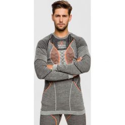 Koszulka X-BIONIC APANI 4.0 MERINO. Szare koszulki damskie termoaktywne X BIONIC, bez wzorów, z wełny, sportowe, bez kołnierzyka, bez rękawów. Za 660,00 zł.
