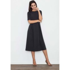 Czarna Sukienka Elegancka Wizytowa Midi. Czarne sukienki damskie marki Molly.pl, do pracy, s, bez wzorów, z tkaniny, eleganckie, z okrągłym kołnierzem, z krótkim rękawem, krótkie, midi, rozkloszowane. Za 145,90 zł.
