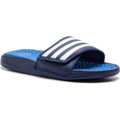 Klapki adidas - adissage Tnd F35564 DkBlue/FTwwht/Trublu. Niebieskie klapki męskie Adidas, bez wzorów, ze skóry ekologicznej. W wyprzedaży za 139,00 zł.