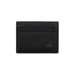 Portfele Calvin Klein Jeans K50K504839 DIRECT CARDHOLDER. Czarne portfele męskie Calvin Klein Jeans, bez wzorów, z jeansu. Za 151,38 zł.