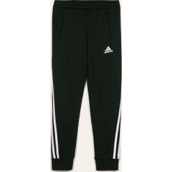 Adidas Performance - Spodnie 116-170 cm. Czarne spodnie dziewczęce adidas Performance, z aplikacjami, z bawełny. Za 159,90 zł.