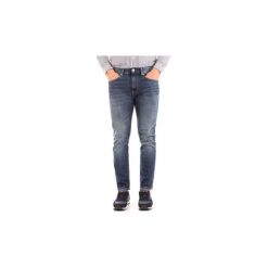 Jeansy slim fit Calvin Klein Jeans J30J308030. Niebieskie jeansy męskie marki Calvin Klein Jeans, z jeansu. Za 328,31 zł.