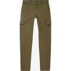 O'Neill Spodnie Brązowy. Pomarańczowe spodnie męskie O'Neill, bez wzorów, z bawełny. Za 395,95 zł.