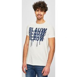 Tommy Hilfiger - Jeansy. Niebieskie jeansy męskie TOMMY HILFIGER, bez wzorów, z obniżonym stanem. W wyprzedaży za 459,90 zł.