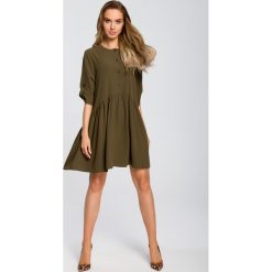 Sukienka odcinana w pasie wiosenna khaki - xl. Brązowe sukienki damskie e-margeritka.pl, do pracy, na wiosnę, xl, bez wzorów, z poliesteru, eleganckie, bez kołnierzyka, z krótkim rękawem, krótkie, mini, rozkloszowane. Za 159,99 zł.